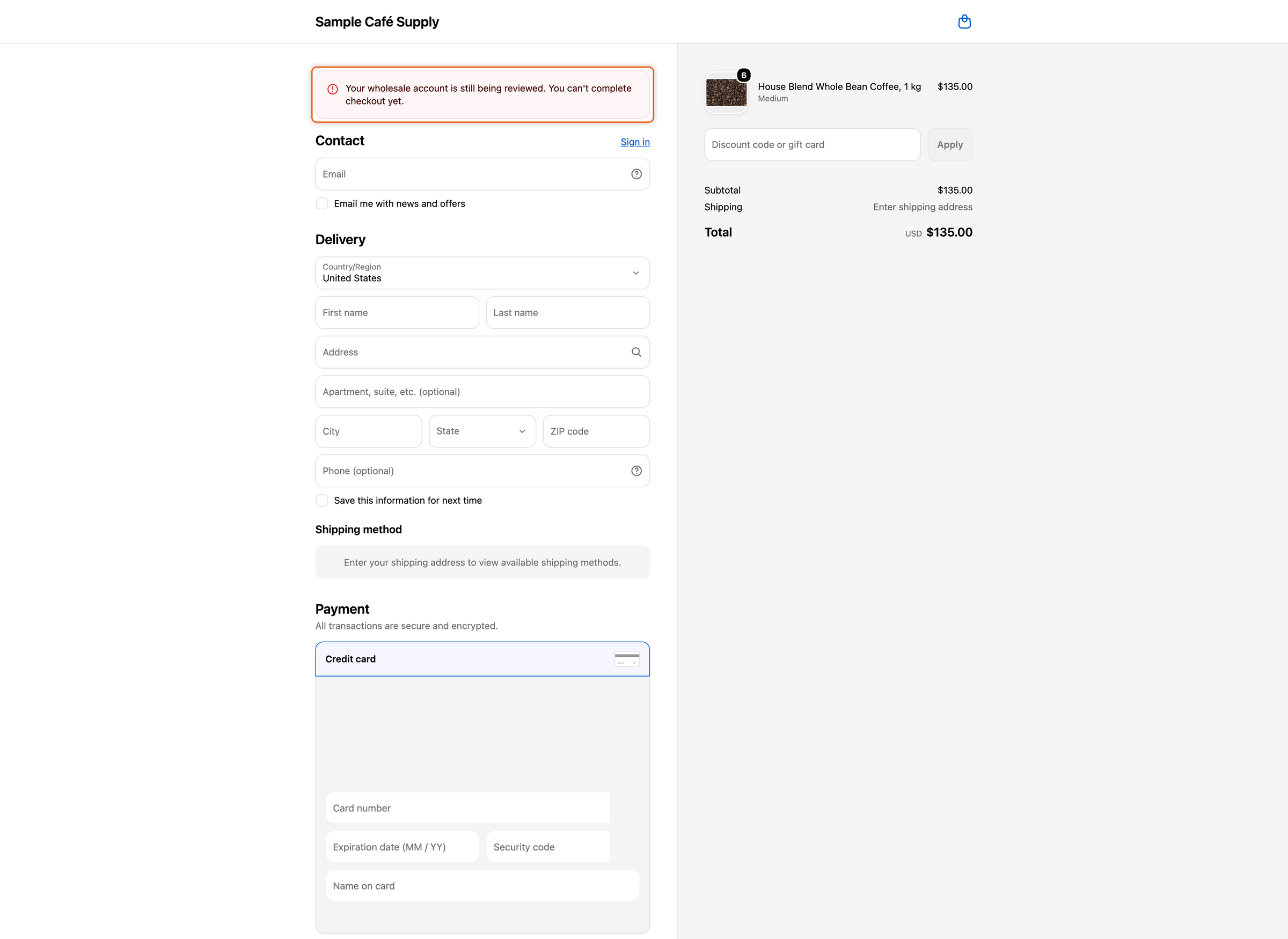 Shopify checkout showing an error message that says the wholesale account is still being reviewed and checkout can't be completed.