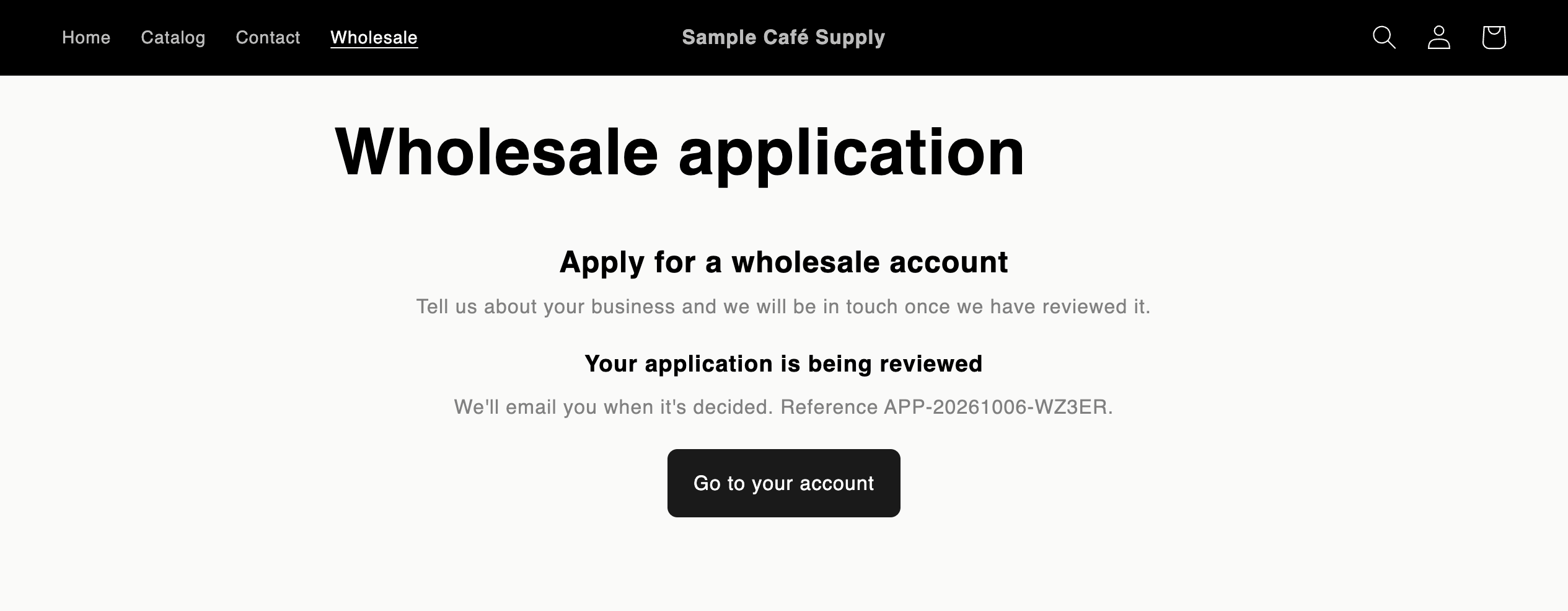 The wholesale application page showing Your application is being reviewed, the application's reference and a Go to your account button instead of the form.
