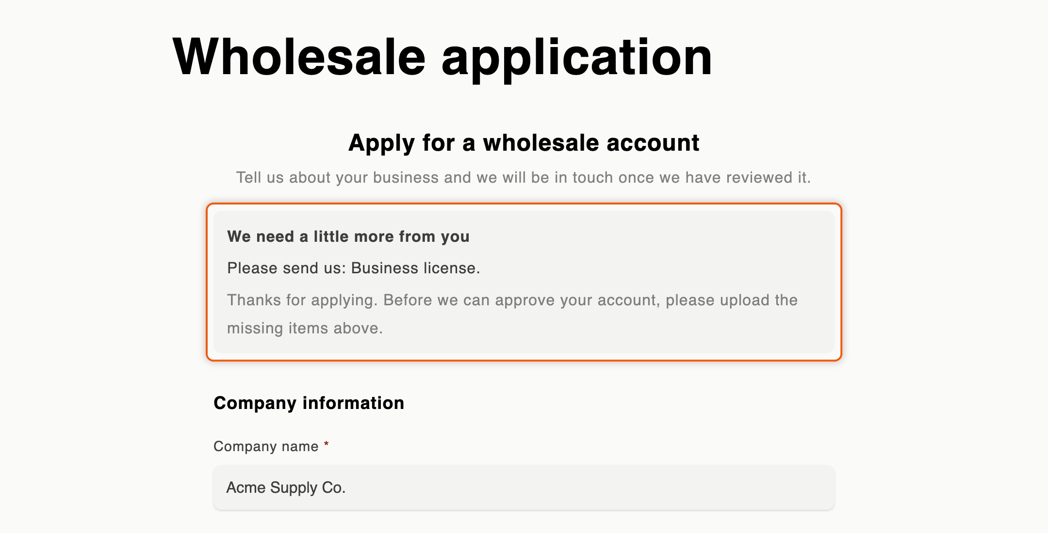 The Wholesale application page with a box reading "We need a little more from you" and "Please send us: Business license." plus the merchant's message, above the Company name field filled with Acme Supply Co.